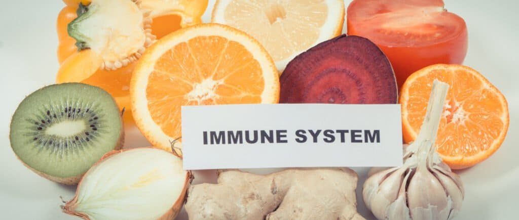 Immune System And Fresh Ripe Fruits With Vegetables. Source Natural Healthy Vitamins