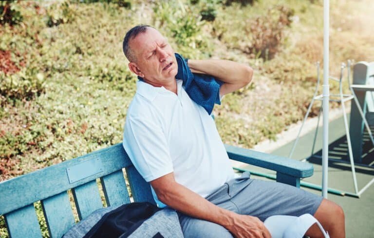 Man showing signs of heat exhausting